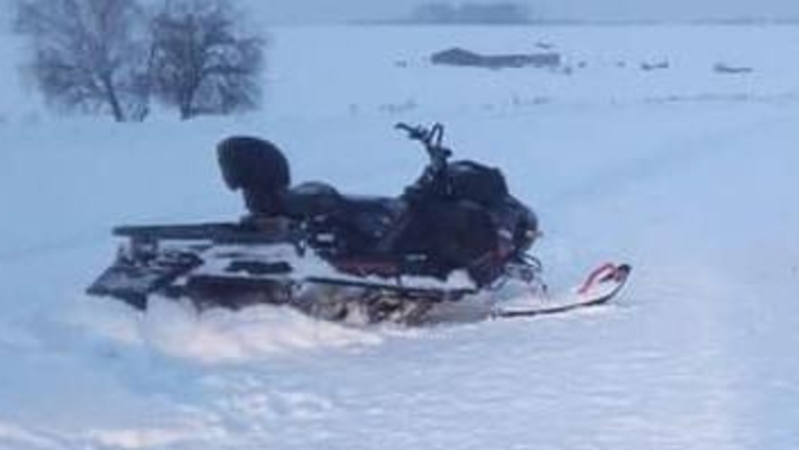 Двое на снегоходе